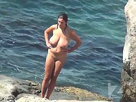 Nu2285# The girl with big tits decided to swim. When she emerges from the water, her huge hemisphere