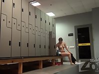 Lo2282# There is only one girl in the locker room. We watch her take off her clothes. The camera is 
