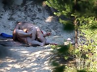 Nu1805# Couple has sex right on the beach. The woman opened her legs wide, dick penetrates deeply in