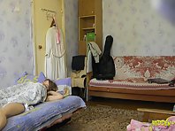 Sp1266# A young girl wakes up, and we see her through a hidden camera
