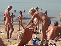 Nu1745# Nude beach voyeur cam closely monitors everything that happens on a nudist beach. The most