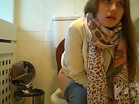 Wc2797# Hidden camera in the toilet cafe. Girl in white panties pee standing up. View from two camer
