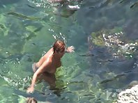 Nu1221# A girl with a shaved pussy and small tits. She wore glasses for swimming and going to dive