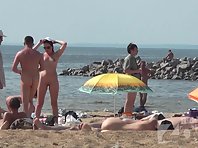 Nu1325# Our nude beach voyeur cam focused on young slender beauty. I'm jealous of the sun's rays t