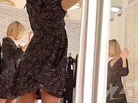 Sp2567# Our new friend happily spins in front of a mirror. This polka dot dress really suits her. Es