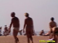 Nu1030# Nudists take a sunburn and play in badminton