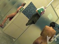 Sh1287# Tanned brunette taking a shower after a workout. Our 