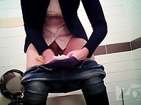 Wc2299# Blonde in blue panties pee standing up. Great pictures with the front camera. Hairstyle on