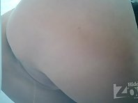 Wc2451# Woman in black panties pee standing up. View from one camera. Shaved crotch and round ass hi