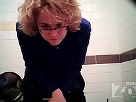 Wc1932# Curly girl in glasses standing pee. Our cameraman filmed at the girls toilets hidden cams 