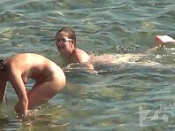 Nu1820#Two girlfriends splashing in the water. Anyone would not mind to join them. And even 