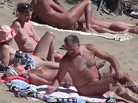 Nu1848#Nudists have a rest on the beach. Their naked bodies on display. Our subscribers can 